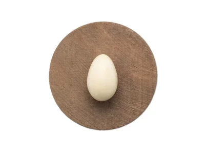 Small hand carved wooden sculpture of a small egg