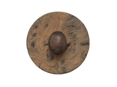 Small hand carved wooden sculpture of egg