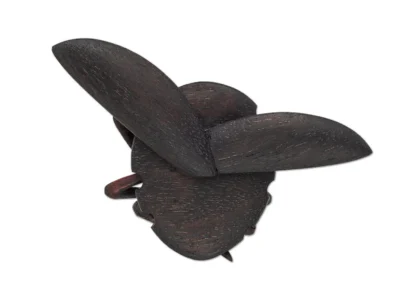 Small hand carved abstract beetle wooden sculpture