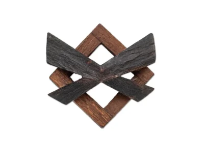 Small hand carved abstract wooden sculpture with moth