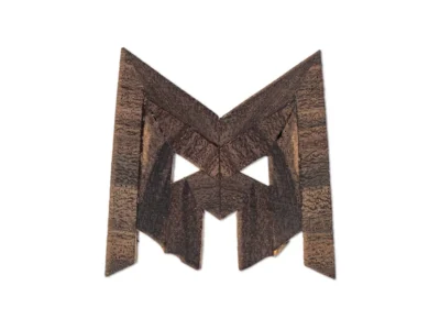 Small hand carved abstract wooden sculpture of mask