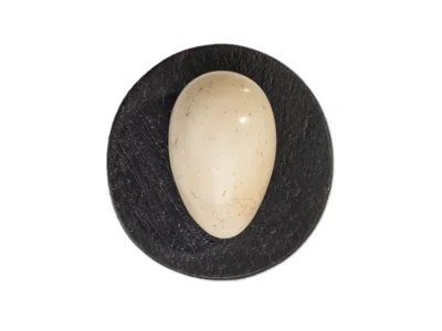 Small hand carved wooden egg sculpture