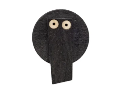 Small hand carved abstract face wooden sculpture