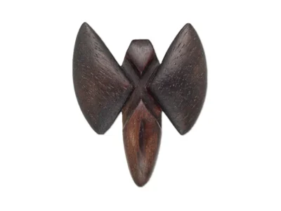 Small hand carved winged creature wooden sculpture