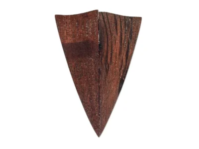 Small hand carved abstract wooden sculpture of folded wings