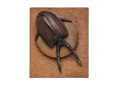 Small hand carved pre-cambrian wooden sculpture